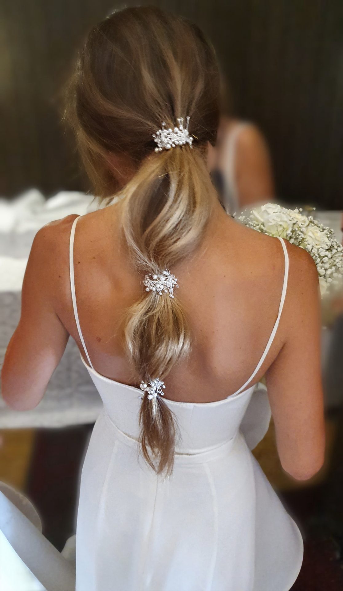 Bridal look by Lee Elrom — bubble ponytail with pearl hairpieces